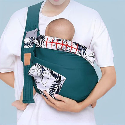 echarpe de portage bébé enveloppé blotti contre maman