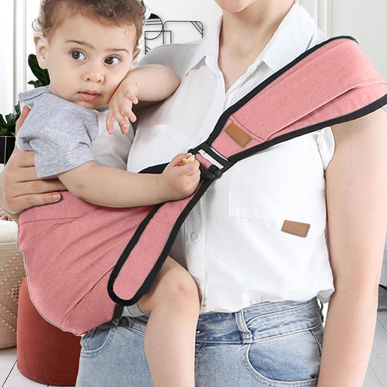 Porte bébé rose enfant porté par maman