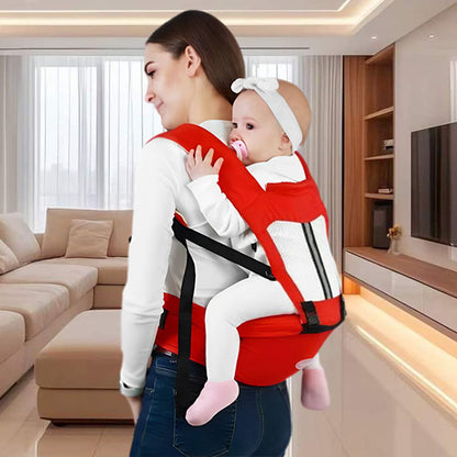 porte bebe rouge portée dans le dos de maman