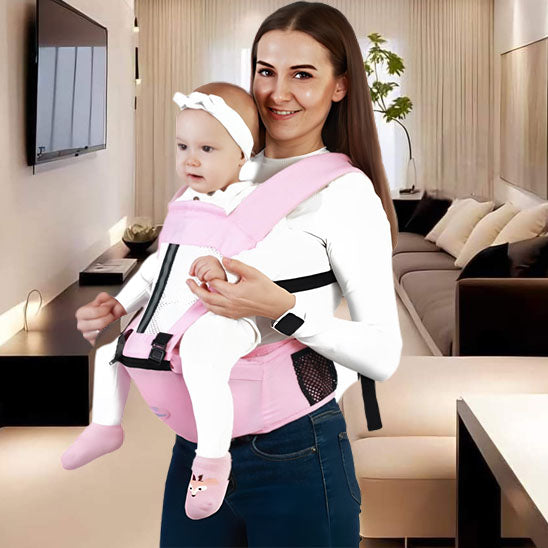 porte bebe rose portée par maman