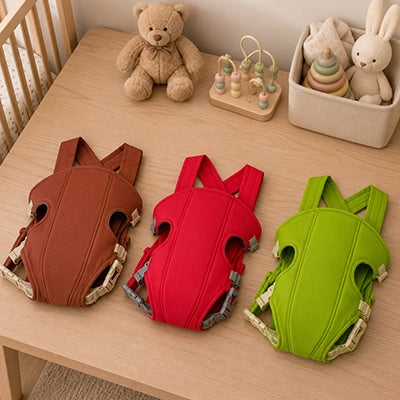 porte bebe de couleur rouge, verte et marron