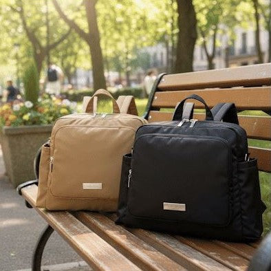 sac à dos à langer noir et marron chics