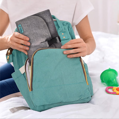 rangement facile dans un sac du tapis à langer nomade